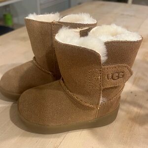Ugg Keelan style, water resistant boots in the color chestnut for infant/walker
